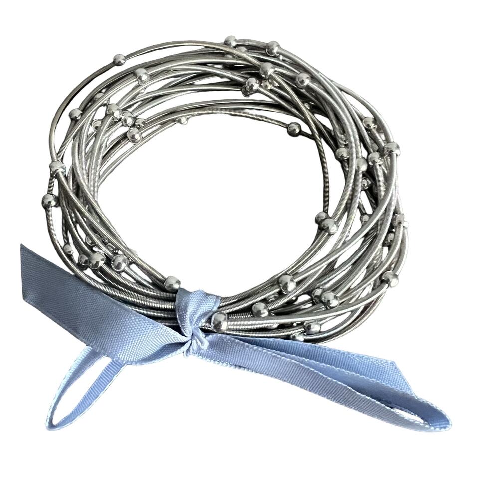 Set of silver cord beaded stackable bracelets